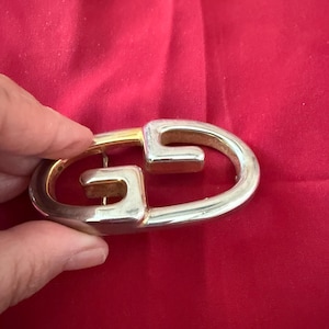 Vintage bellissima fibbia originale Gucci oro e argento per cintura.