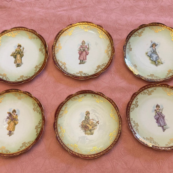 Antique bread and butter dishes Vienna Austria with ladies, red and gold border. Piattini pane e burro o dolce Vienna Austria damine.