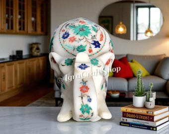 装飾的な鼻を上にした象の彫刻、白い大理石の象の置物、インドの大理石