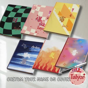 May include: A collection of personalized notebooks with various designs and names. The covers feature patterns like checkered, geometric, and watercolor effects in colors such as green, pink, yellow, blue, and orange. Each notebook has a name printed on the cover.