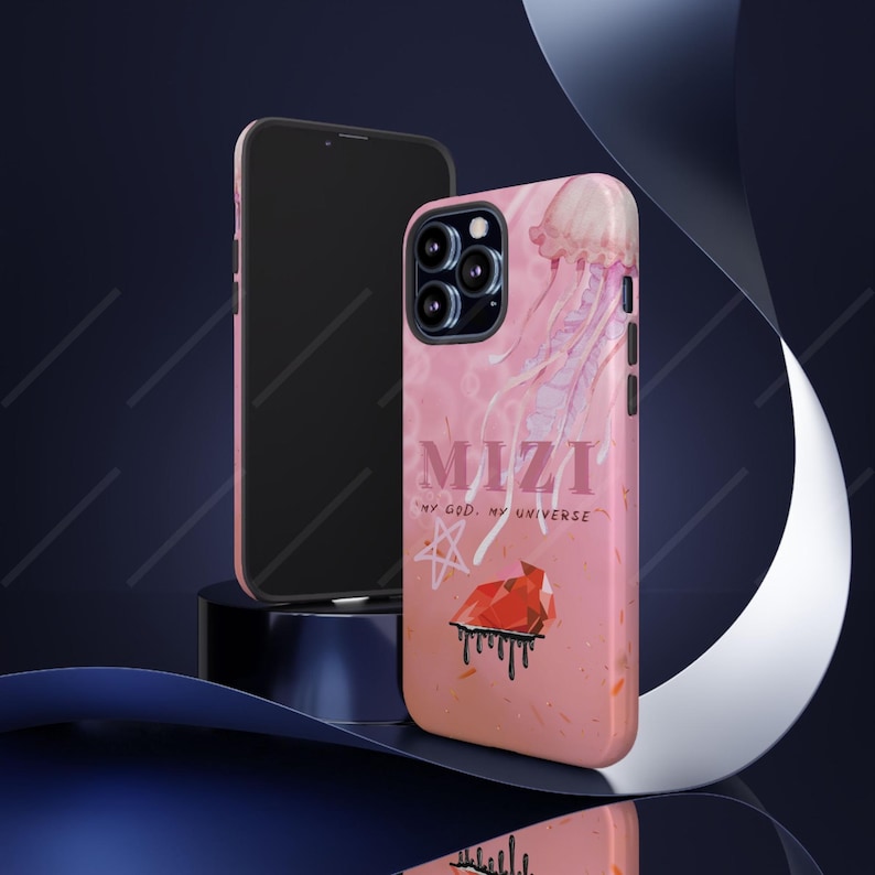 May include: Pink phone case with a jellyfish design and the word "MIZI". The case also features a star and a red geometric shape with black drips. A black phone is next to the case.