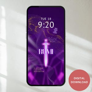 May include: A smartphone screen displays a digital wallpaper with a purple background and gold accents. The design features a glowing sword, the name "RUMI," and the text "NO MORE HIDING, I'LL BE SHINING, LIKE I'M BORN TO BE." The time is 9:20.