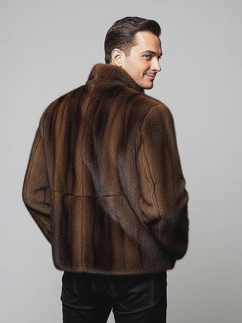May include: A brown fur jacket with a high collar. The jacket has a vertical striped pattern and is worn by a person. The person is looking over their shoulder. The jacket appears to be made of a soft, luxurious material.
