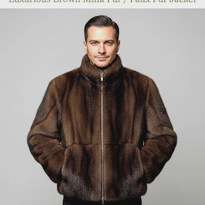 May include: A brown faux fur jacket with a high collar and a full-length zip. The jacket has a soft, textured appearance and two front pockets. The text at the top of the image reads "Luxurious Brown Mink Fur / Faux Fur Jacket."