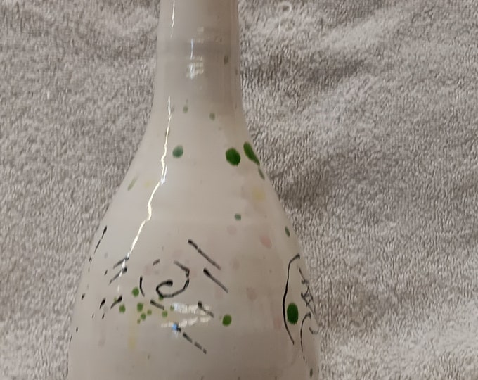 Olive Oil bottle. A hand crafted, ceramic, olive oil bottle for your kitchen needs. This includes a funnel and the pouring top.