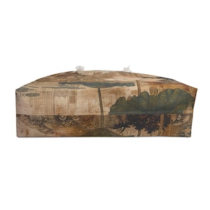 May include: A rectangular tote bag with a vintage map design. The bag features a large green leaf and tree illustration on a beige background. White rope handles are visible at the top.