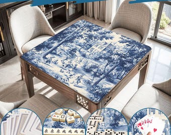 May include: Wooden table with a blue and white toile design, featuring a pastoral scene. The table is surrounded by chairs. The image includes close-ups of playing cards, dominoes, and mahjong tiles, suggesting a game table.