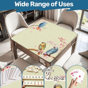 May include: A wooden game table with a cream-coloured surface featuring a watercolour design of parrots on a flowering branch. The table is surrounded by chairs and has various games displayed, including cards, dominoes, and mahjong tiles. The text "Wide Range of Uses" is at the top.