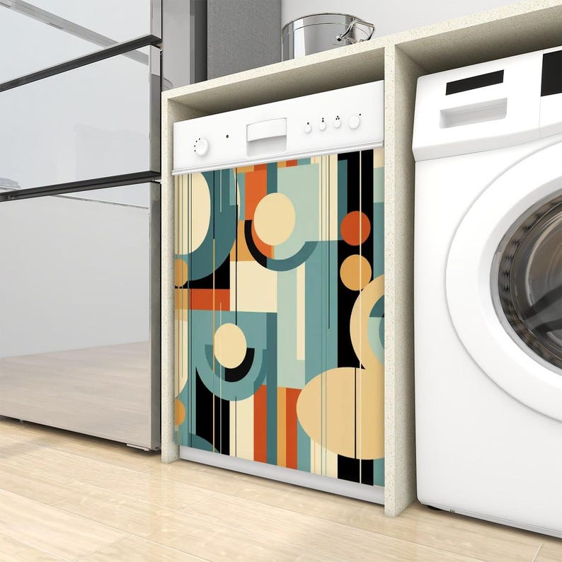 Puede incluir: Un lavavajillas blanco con un patr&oacute;n geom&eacute;trico colorido en la parte delantera. El patr&oacute;n presenta c&iacute;rculos, cuadrados y rayas en tonos de azul, naranja, amarillo y negro.