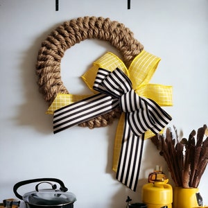 Maritimer Jute-Seil-Kranz-Wandbehang-dekoratives Seil mit gelb schwarzer Schleife-minimalistisches Design-Innenwand-Mini-Tür-Kranz-Tür-Handwerk Bild 2