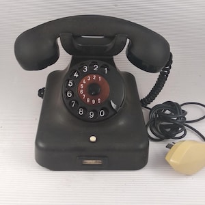 Teléfono antiguo de baquelita con disco giratorio Siemens Alemania Negro