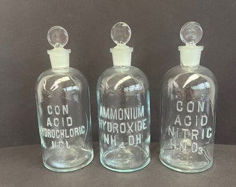 Set of three 500 mL Glass Apothecary (Chemistry) Bottles With Glass Stoppers - Raised Glass Labels: HCl acid; Nitric Acid; Ammon. Hydroxide
