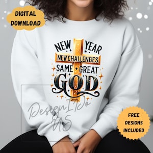 May include: White sweatshirt with a gold cross design and the text "New Year New Challenges Same Great God".
