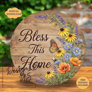 May include: Round wooden sign with the text "Bless This Home" and floral and butterfly accents. The sign features a rustic wood grain background and a colorful arrangement of flowers, including yellow, blue, and orange blooms.