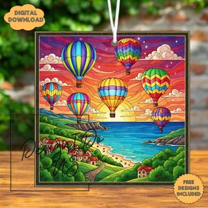 May include: A colorful hot air balloon ornament with a vibrant sunset scene. The image features multiple hot air balloons in various colors, a coastal landscape, and the text "DIGITAL DOWNLOAD" and "FREE DESIGNS INCLUDED".