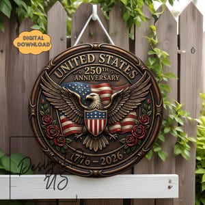 May include: A circular, bronze-toned sign celebrating the 250th anniversary of the United States. It displays an eagle, the American flag, and the inscription "UNITED STATES 250TH ANNIVERSARY 1776-2026". The design also incorporates red roses.