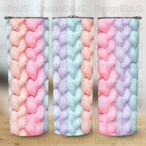 May include: Three 20 oz. stainless steel tumblers with a pastel heart-knit design. The design features a gradient of pink, peach, lavender, and blue. Each tumbler has a silver lid and a clear straw.