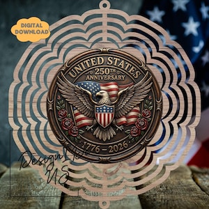 May include: Wooden ornament with a detailed emblem celebrating the 250th anniversary of the United States. The emblem features an eagle, American flag, and roses, with the years 1776-2026. The ornament has a decorative, layered design and a small hole for hanging.