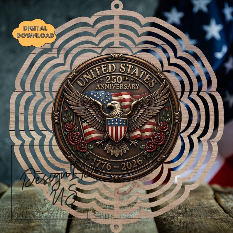 May include: Wooden ornament with a detailed emblem celebrating the 250th anniversary of the United States. The emblem features an eagle, American flag, and roses, with the years 1776-2026. The ornament has a decorative, layered design and a small hole for hanging.