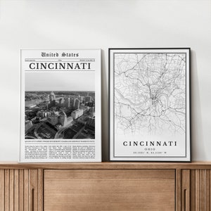 May include: Two black and white prints of Cincinnati, Ohio. The first print is a photograph of the city skyline. The second print is a map of the city. Both prints have the text "Cincinnati, Ohio" and the coordinates of the city.