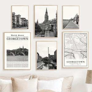 May include: A collection of six framed black and white prints. The prints depict various scenes of Georgetown, including streetscapes, a university building, a bridge, a river scene, and a map. The frames are a light wood color.