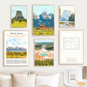 May include: A set of framed landscape prints depicting Wyoming scenery. The images include mountains, a barn, a geyser, and a state map. The colour scheme features greens, blues, and browns, with neutral-toned frames.