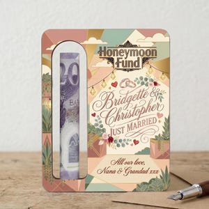 May include: A decorative wedding gift card with a cutout revealing a twenty-pound note. The card features the words "Honeymoon Fund" and "Bridgette & Christopher JUST MARRIED." The design includes floral elements and the message "All our love, Nana & Grandad xxx."
