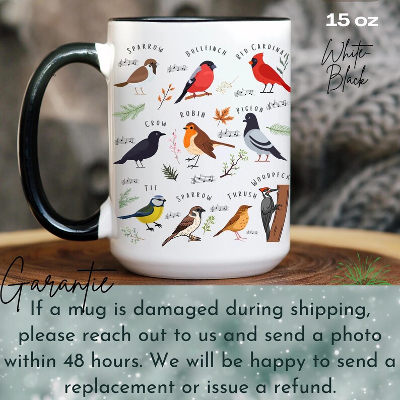 May include: White ceramic mug with a black handle. The mug features a colorful illustration of various birds with their names printed below each bird. The text "15 oz White Black" is printed on the top right corner of the mug.