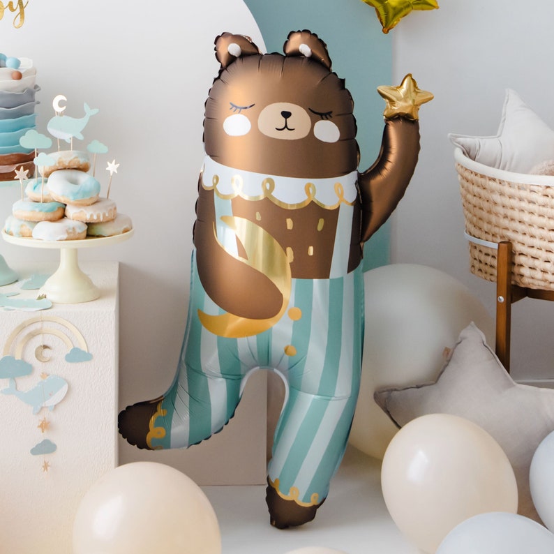 Large teddy bear foil balloon in blue striped pajamas with gold star and moon, baby shower and birthday party decor