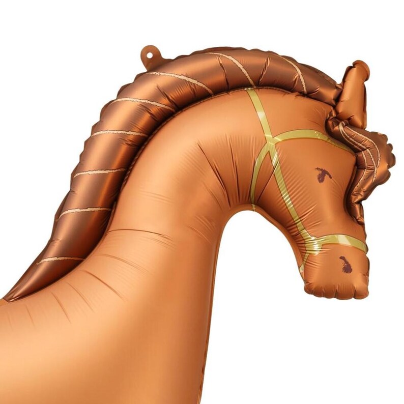 Close up of brown galloping horse foil balloon showing detailed mane, face and metallic finish
