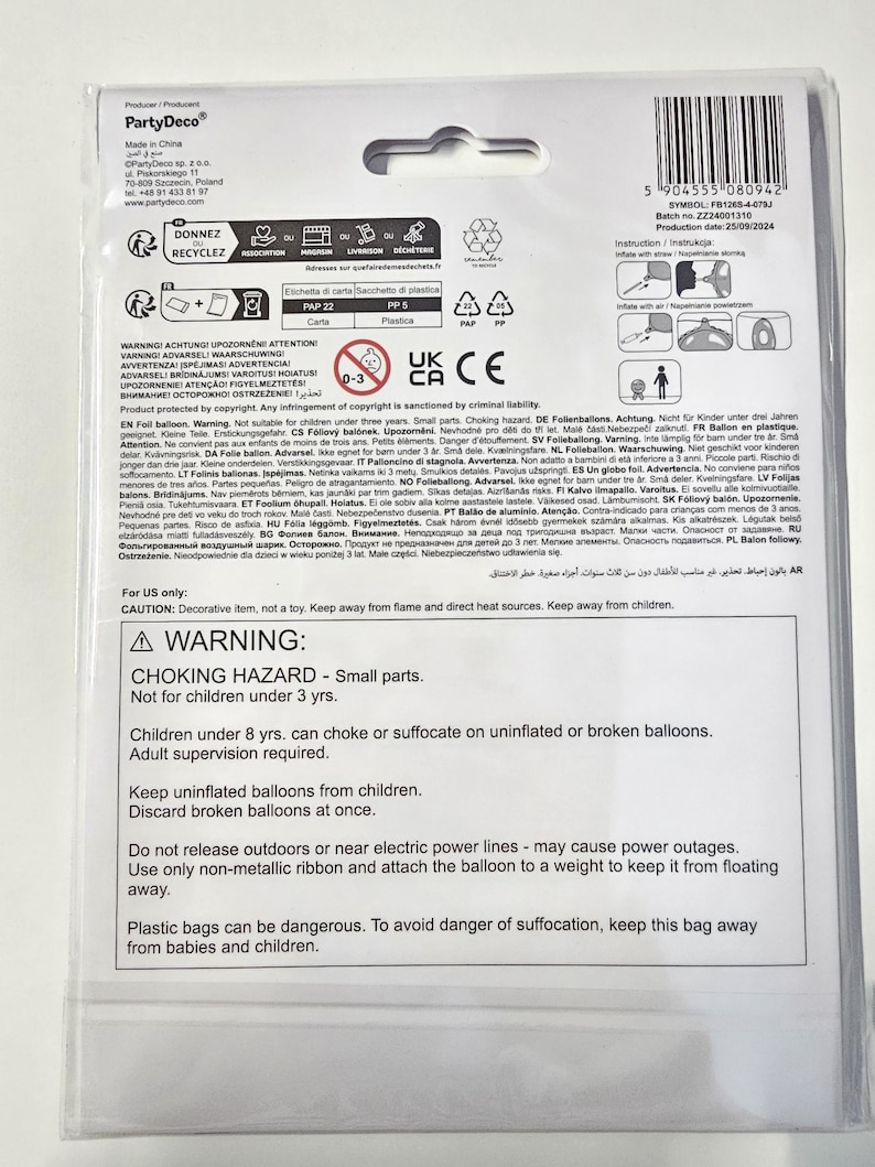 May include: A warning label for a foil balloon. The label is printed in English and several other languages. The label warns about choking hazards and the importance of adult supervision when using balloons. It also warns about the dangers of plastic bags and the need to keep them away from children.