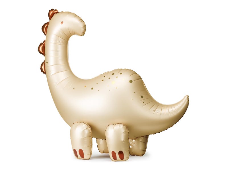Cream-colored dinosaur-shaped brontosaurus foil balloon with metallic gold accents and copper spikes along its back, standing upright with rounded legs and a curved tail.