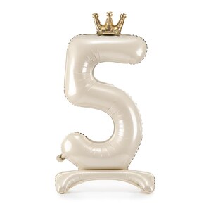 May include: A large, white, inflatable number five with a gold crown on top. The number is standing upright on a white base.