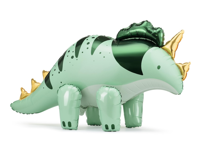 Giant standing dinosaur balloon in green and gold, shaped like a triceratops with 3D legs and horns, perfect for boy's birthday, dino-themed party or baby shower decorations — self-standing foil balloon 36.5 x 19 inches.