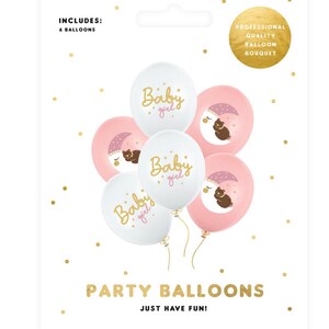 May include: A set of six baby girl party balloons. Three white balloons with gold lettering that says "Baby girl" and three pink balloons with a sleeping bear and moon design.