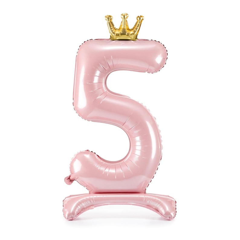 May include: A pink number 5 balloon with a gold crown on top. The balloon is standing upright on a base.