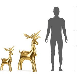 Two gold reindeer-shaped foil balloons, one approximately 70 cm tall and the other about 110 cm tall, shown next to a human silhouette for size comparison, ideal for Christmas and holiday party decorations.