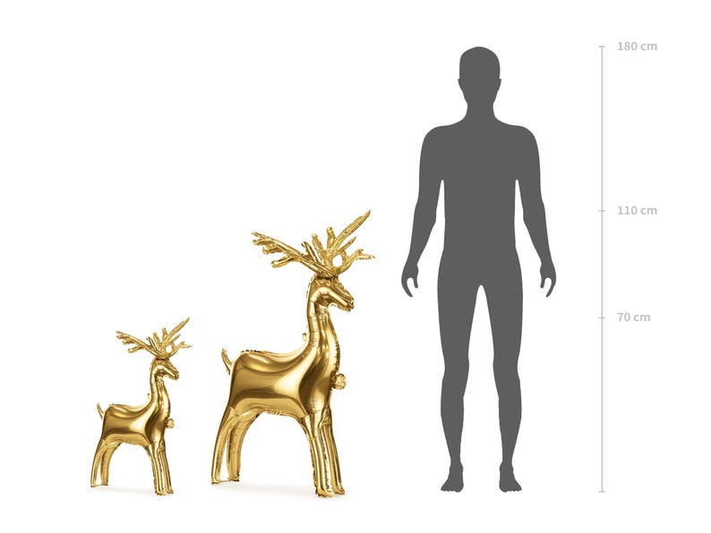 Two gold reindeer-shaped foil balloons, one approximately 70 cm tall and the other about 110 cm tall, shown next to a human silhouette for size comparison, ideal for Christmas and holiday party decorations.