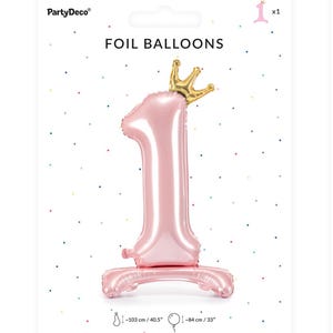 May include: Pink foil balloon shaped like the number 1 with a gold crown on top. The balloon is 40.5 inches tall and 33 inches wide.