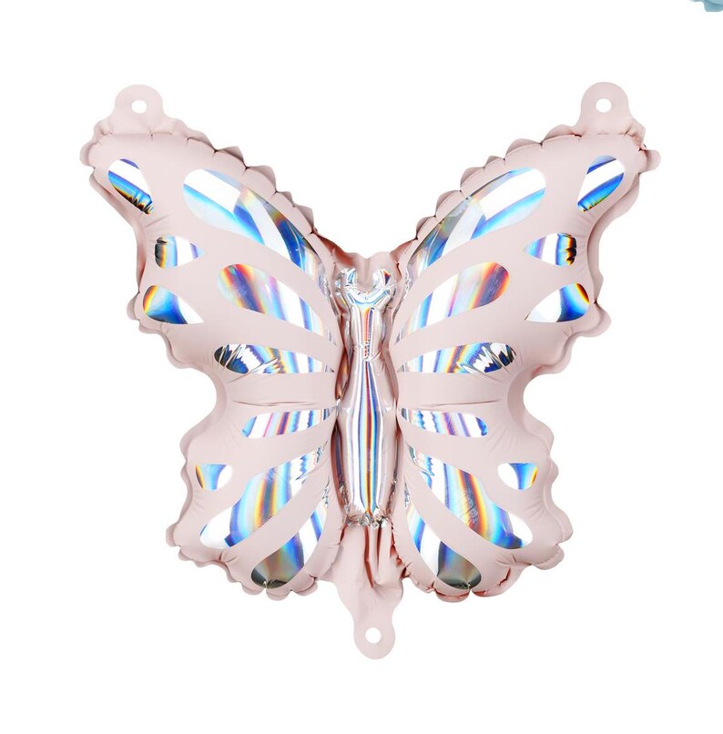May include: A pink iridescent foil butterfly balloon. The balloon is shaped like a butterfly with wings that have a holographic finish.