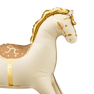 May include: A white and gold foil balloon shaped like a rocking horse. The horse has a brown saddle with a gold trim and a gold mane and tail.