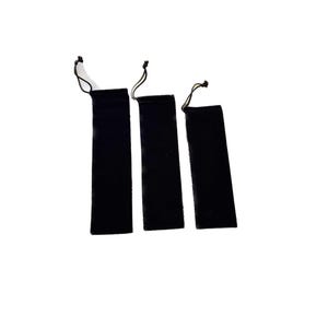 May include: Three black velvet drawstring pouches of varying sizes.