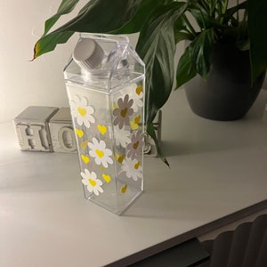 Daisy milk water bottle