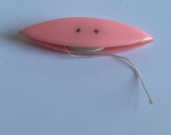 Pink tatting shuttle, vintage
