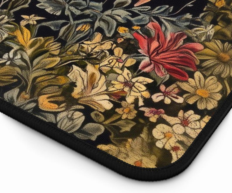 May include: A black background with a floral pattern in shades of yellow, red, and green. The flowers are stylised and have a vintage look.