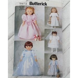 May include: Butterick sewing pattern 5971 featuring illustrations of dolls wearing various dresses. The pattern includes designs for a pink gown, a white dress, a white bridal outfit with a veil, a blue gown, and a patterned blue dress.