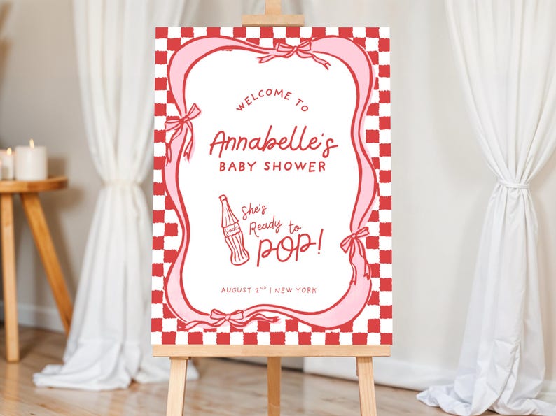 She’s Ready to Pop Baby Shower Welcome Sign – 50s Soda Pop-Inspired Canva Template. This Baby Shower Sign Template is a charming and playful way to welcome guests to a bubbly baby bash. Designed in a retro 1950s soda pop shop style, it features whimsical hand-drawn details of a bottle of Cola, glass of pop & a dirty soda, with a wavy pink & red border tied with bows on a red & white chequered background. Retro vintage style whimsical fonts are also used. Gender-neutral baby shower. 18x24, 20x30