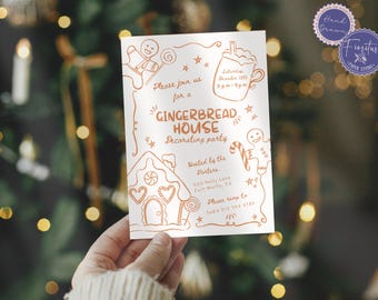 May include: A white invitation card with a gingerbread house decorating party theme. The card features a gingerbread house, gingerbread men, and a cup of hot chocolate. The text on the card reads "Please join us for a Gingerbread House Decorating Party" and includes the date, time, and location of the party.