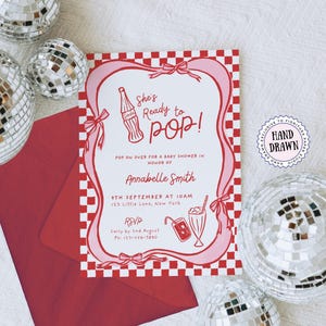 以下が含まれることがあります： 赤と白のチェック柄の縁とピンクのアクセントが施されたベビーシャワーの招待状。招待状には「She's Ready to Pop!」というテキストと、Annabelle Smithのベビーシャワーの詳細、赤い封筒、ディスコボールが含まれています。