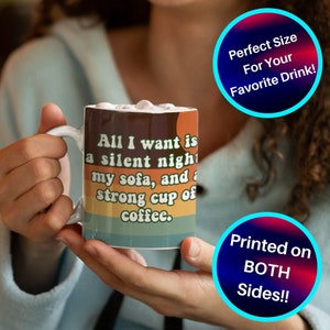 May include: White ceramic mug with a retro design featuring the text "All I want is a silent night, my sofa, and a strong cup of coffee." The mug is printed on both sides.